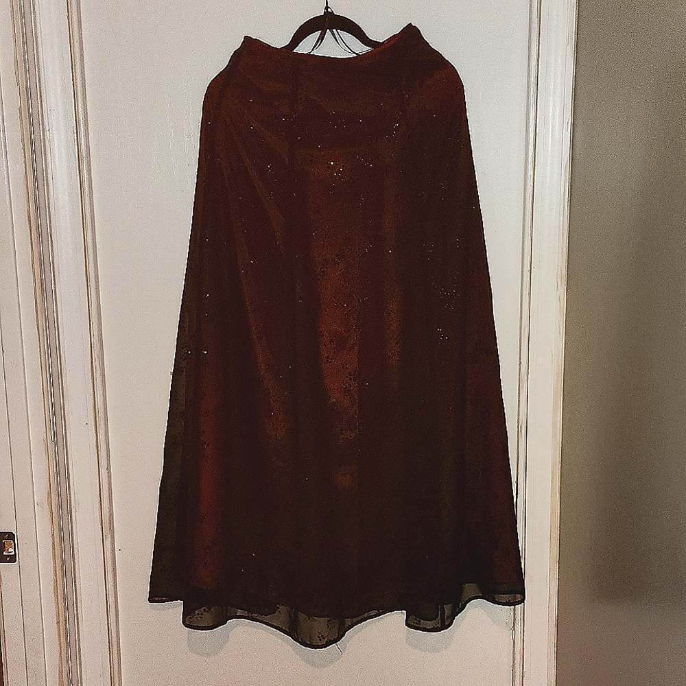 Juniors Burgundy and Black lace overlay floor length skirt gown.